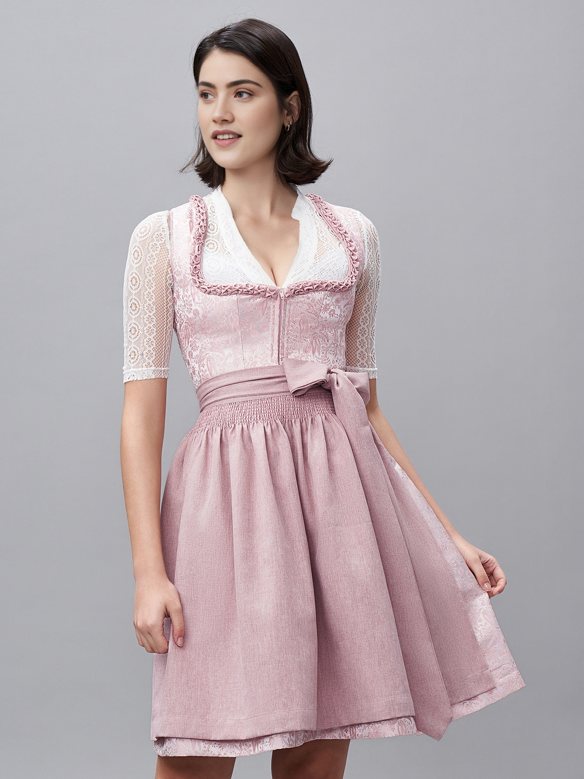 Grau rosa Dirndl mit eleganter Schnürung